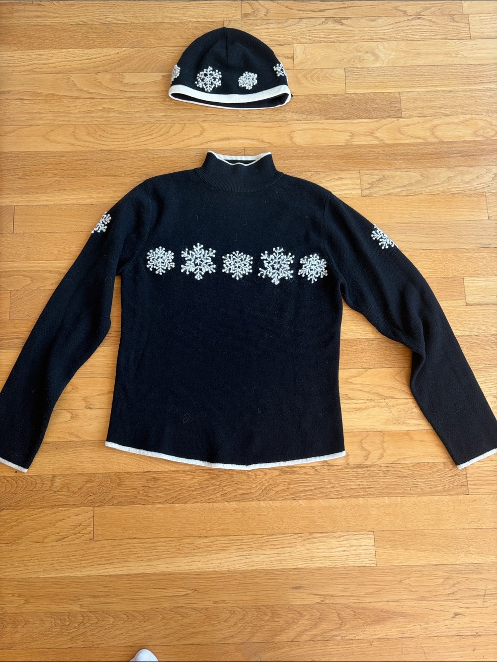 Obermeyer Black Turtleneck Sweater with White Snowflake Accents
